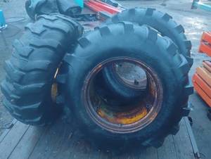 lot 2 image: Pair of Used 16.9-24 Armstrong Industrial Tractor Tires on Band Dual Wheels 1 Other