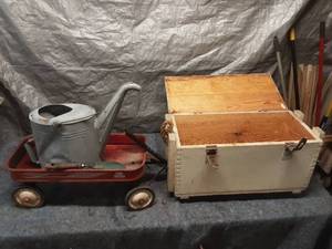 lot 6 image: Antique Metal Watering Can and Wooden Storage Chest with Wagon