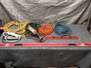 lot 47 image: Lot of Extension Cords, Levels, and Work Light