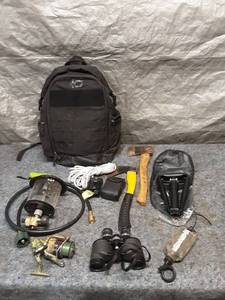 lot 90 image: Outdoor Survival Gear Set with Backpack, Axe, Binoculars, and More