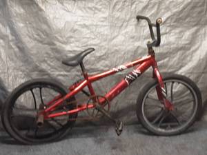 lot 91 image: Used Red BMX Trick Bike with Black Wheels