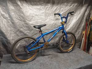 lot 94 image: Used Blue Mongoose BMX Bicycle with Gold Accents