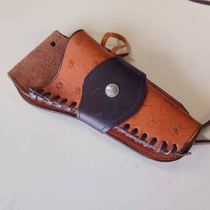 lot 43 image: WAYNE WEST Handcrafted cowboy pistol holster