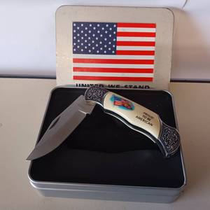 lot 74 image: MADE IN AMERICA FOLDING KNIFE
