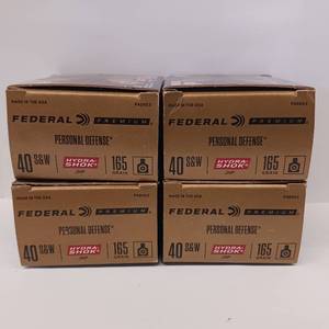 lot 157 image: FEDERAL PREMIUM PERSONAL DEFENSE  40 S&W 165 GRAIN  Lot of 4 boxes