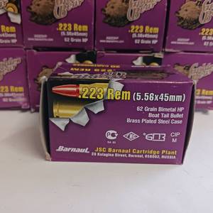 lot 208 image: Golden Bear .223 REM (5.56x45) - 62 grain bimetal HP - Boat Tail Bullet in brass plated steel case - 9 Boxes - 20 rounds each 180 total