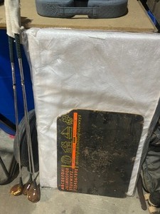 lot 21 image: 3 gulf clubs     crib mattress  old chalk  board