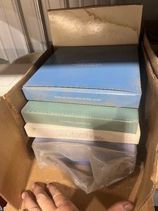 lot 34 image: Shelf Full of Avon Collectables