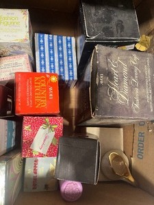 lot 42 image: Shelf full of Avon Collectables