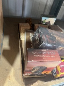 lot 43 image: Shelf full of Avon Collectables