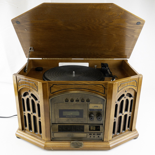 lot 23 image: 2000 Thomas Pacconi Classics CD, Cassette, Record, & AMFM Radio Player