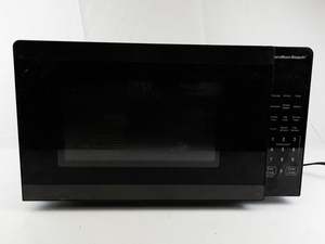 lot 11 image: Walmart Black Countertop Microwave Oven. ModelHB54BK100112161