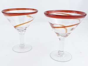 lot 150 image: Pair of Oversized Red Swirl Martini Glasses