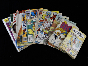 lot 218 image: Group of 9 Comics