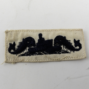 lot 282 image: WWII USN Submarine Black on White Dolphins Patch