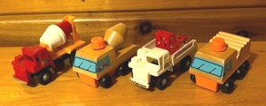 lot 204 image: Four Toy Trucks