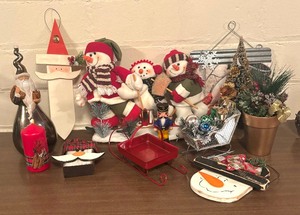 lot 217 image: Cheery Holiday Decor including Sleighs, Candle, Wall Decor, Faux Greenery and More