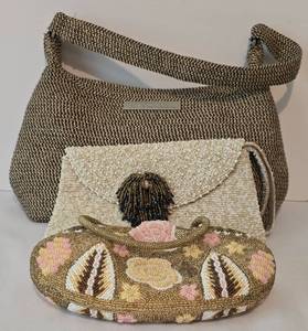 lot 186 image: Neutral-Toned Handbag Trio