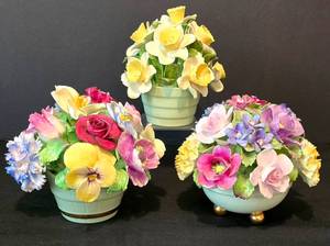 lot 240 image: Three Vintage Hand Painted Bone China Floral Figurines