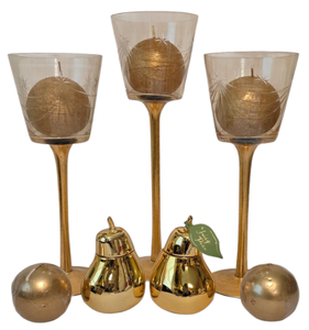 lot 243 image: Set of Three Gold Colored Candle Holders and Decorative Candles