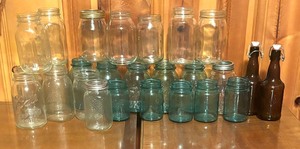 lot 396 image: Canning Jars and Two Bottles