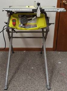 lot 2 image: Ryobi 10 Corded Table Saw Model RTS12 (View Photos)