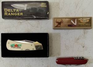 lot 30 image: Pocket Knives (1) Florida (1) Frost Cutlery - Delta Ranger (1) Multi - Tool Pocket Knife (1) White Tail Cutlery - Blue Handle (View Photos)