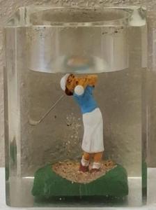 lot 51 image: (1) Clear Float Lighter Holder with a Golfer (Holder Only)  View Photos