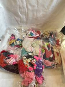 lot 14 image: Lot of Homemade Barbie Doll Clothes