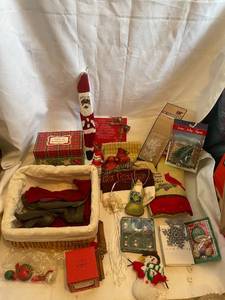 lot 31 image: Festive Holiday Decor Collection with Santa Figurines, Tree Ornaments, and Baskets