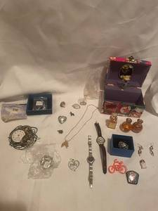 lot 42 image: Assorted Jewelry Collection with Watches, Necklace, and More