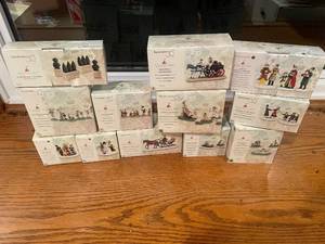lot 76 image: Collection of 12 Department 56 Seasons Bay Village Scene Figurines