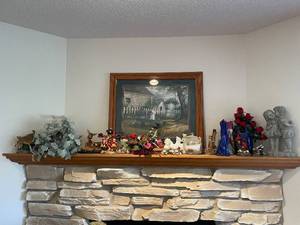 lot 85 image: Assorted Decorative Items Including Figurines, Candle Holders, and Floral Arrangements