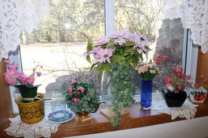 lot 500 image: artificial flower displays in vases...