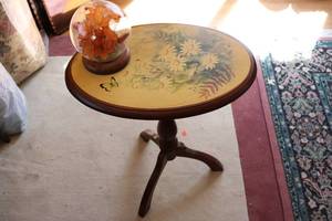 lot 565 image: wooden table with flower design and...