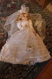 lot 604 image: Vintage doll in wedding dress...