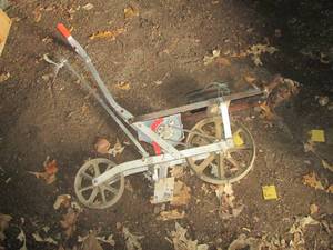 lot 58 image: Antique Manual push planter...