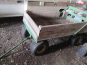 lot 64 image: John Deere themed pull behind haywa...