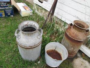 lot 109 image: Pair of vintage metal milk cans and...