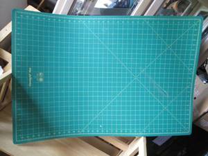lot 175 image: OmniGrid 24x36in craft cutting mat...