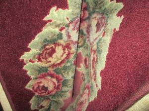 lot 191 image: Deep burgundy and floral 57ft are...