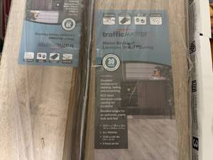 lot 113 image: 14 Boxes of Traffic Mater Laminate Wood Flooring - Oak Knoll