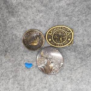 lot 20 image: Minnesota Brass Belt Buckles and Deco Pins