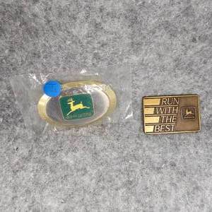 lot 24 image: John Deere Belt Buckles