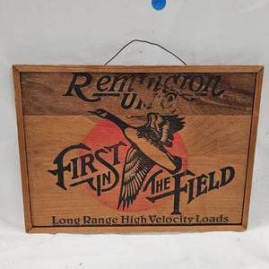lot 69 image: Wooden Remington UMC Sign