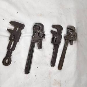 lot 99 image: Lot of 4 Miniature Pipe Wrenches
