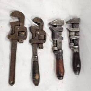 lot 102 image: Lot of 4 Miniature Pipe Wrenches