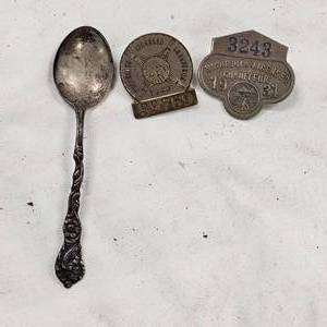 lot 113 image: Early 20th Century MN Chauffer License Badges and Silver Spoon