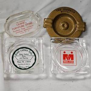 lot 168 image: (4) Advertising Ashtrays, Johnson Motel, Green Lantern Caf, Midland Coop,Cranes Furniture