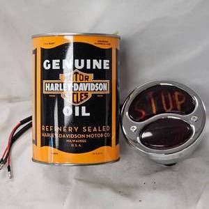 lot 182 image: Steel Can of Genuine Harley Davidson Oil Full and as New Rear Stop Tail Light